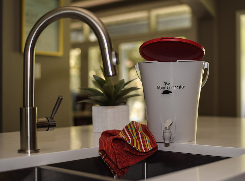 Urban Composter - Small red in kitchen
