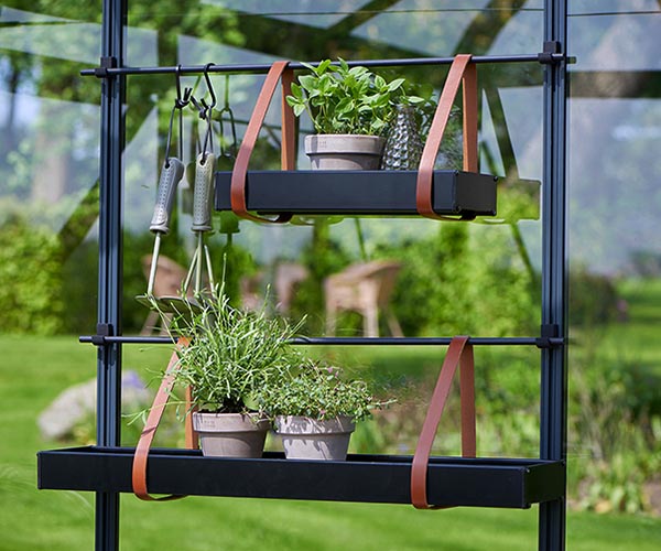 Hanging shelves with leather straps