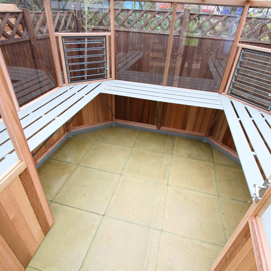 All around staging in Octagonal cedar greenhouse by Alton