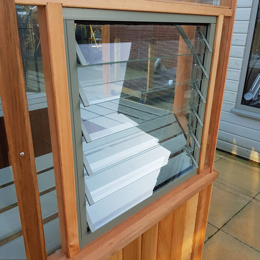 Louvre window in Octagonal cedar greenhouse by Alton