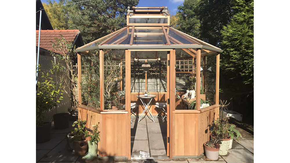 Octagonal cedar greenhouse by alton