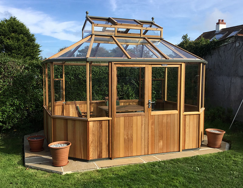 Octagonal cedar greenhouse by Alton